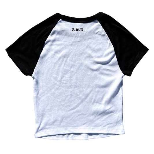 White t-shirt with black sleeves featuring a logo on the upper back against a white background